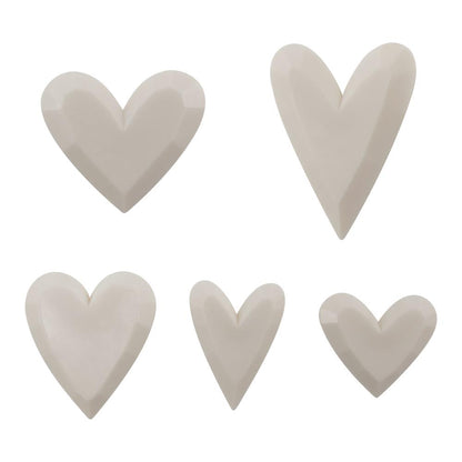overview of Salvaged Hearts - Idea-Ology Resin Models by Tim Holtz ... 5 (five) dimensional faceted hearts made of creamy white resin, ready for altering and using in mixed media, home decor and visual arts.&nbsp;  Tim's Salvaged Hearts are fantastic to turn into flowers, use as flower centres, turn into bodies of mermaids, make faux chocolates, add to cards, frames or Vignette displays, altered with metallics using inks or leaf, use however you wish. TH94380