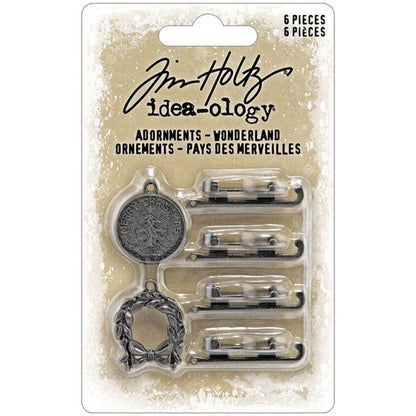 Wonderland - Ice Skates, Wreath and Tag ... Idea-Ology Metal Adornments by Tim Holtz. Beautifully detailed bright silver coloured metal pieces to use as embellishments for making art, mixed media, display makes, home decor, tags and cards, journal pages, book covers, scrapbooking, all kinds of visual creative arts. 6 (six) pieces, 1 round festive tag with tree and words 'Merry Christmas', 1 leafy wreath with bow, 2 pairs of ice skates (4 skates). TH94486