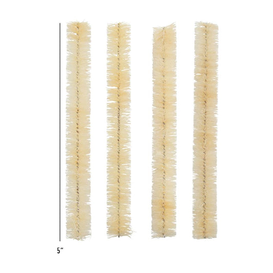 Tim Holtz Idea-Ology Woodland Garlands, a 5" long natural bristle embellishment used for making wreaths, tree-rings, decorative elements in papercrafts and mixed media. Photograph showing the length with markings for size. TH94418