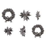 Deck the Halls - with holly, poinsettia flower and a Christmas Wreath ... Idea-Ology Adornments by Tim Holtz - Exquisitely detailed silver coloured metal flat-backed charms for use in mixed media, visual arts, papercrafts. Pack of 6 (six), 2 of each design.   Christmas Wreath is a miniature metal wreaths with intricate leaves, bows and berries. Poinsettia flower (2 sizes, one of each) has beautiful delicate petals. Holly Leaf (2 sizes, one of each) is a wonderfully detailed seasonal leaf.