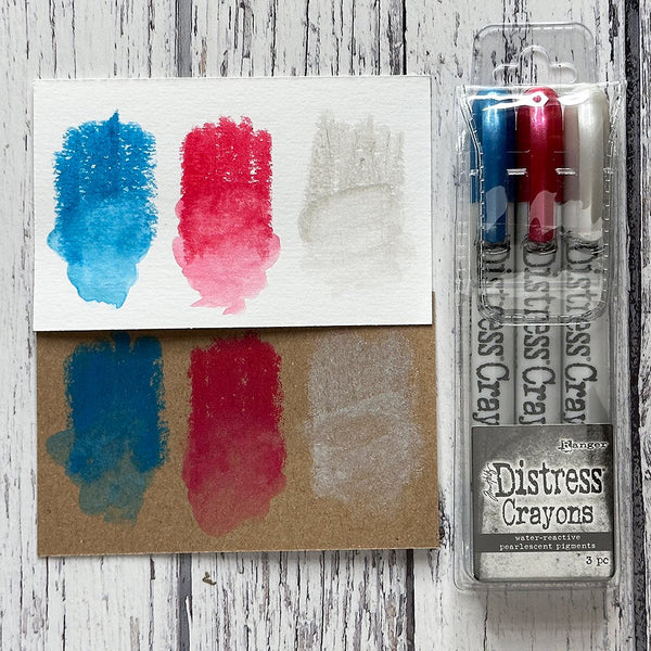 Distress Pearlescent Crayons - Christmas Set 5 ... by Tim Holtz... Limited Edition, seasonal colours of pearlescent shimmery pigment mica fusion in a solid watersoluble crayon in a twist-style barrel with lid. This set has 3 (three) colours (one of each) - Juniper Berry, Yuletide, Frozen Fog.   Tim Holtz Distress Mica Pearl Crayons in these seasonal colours add beautiful pearlescent colourful layers to your artwork. 
