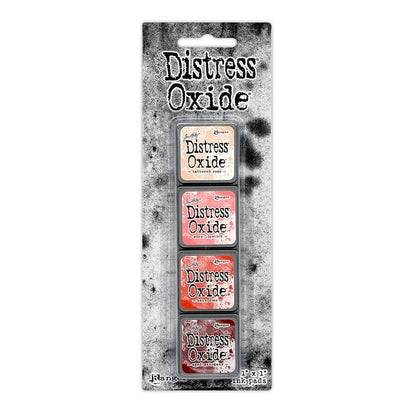 Mini Distress Oxide Ink Pads - Set 13 - by Tim Holtz and Ranger ... featuring water-reactive dye and pigment ink fusion that creates an oxidised effect when spattered, stamped, brushed and or sprayed with water. The colours are opaque and dry with a soft matte finish. Set of 4 (four) colours in Mini Ink Pad Cubes with 1" square raised felt, one of each (TDIK91592).

Colours in this set are ...
- Tattered Rose
- Worn Lipstick
- Barn Door
- Aged Mahogany
... one of each colour.