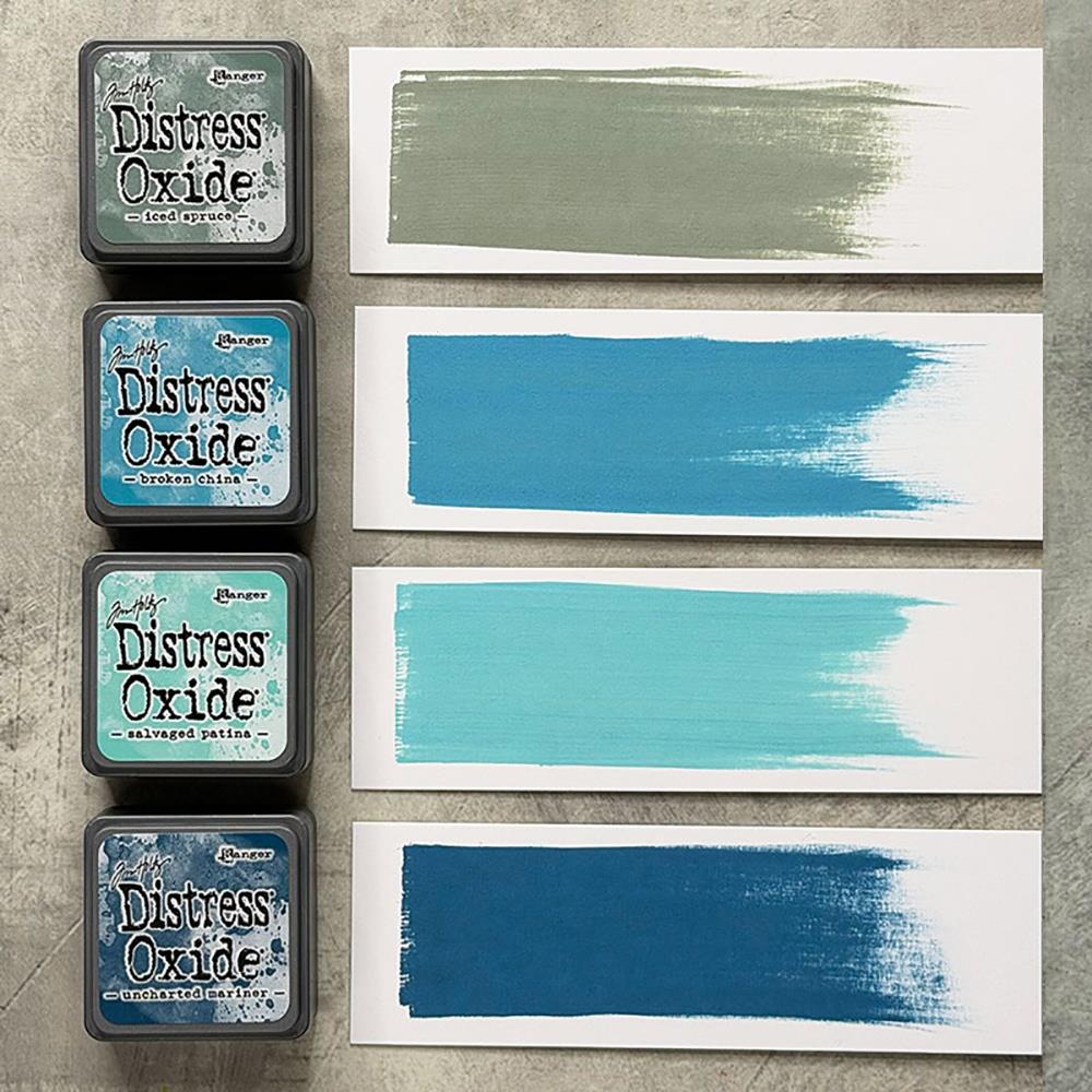 Mini Distress Oxide Ink Pads - Set 16 - by Tim Holtz and Ranger ... featuring water-reactive dye and pigment ink fusion that creates an oxidised effect when spattered, stamped, brushed and or sprayed with water. The colours are opaque and dry with a soft matte finish. Set of 4 (four) colours in Mini Ink Pad Cubes with 1" square raised felt, one of each (TDIK91622).

Colours in this set are ...
- Iced Spruce
- Broken China
- Salvaged Patina
- Uncharted Mariner
... one of each colour.