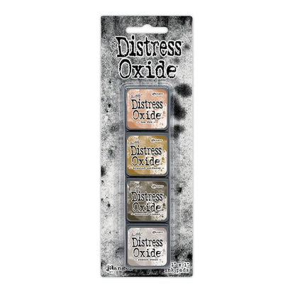 Mini Distress Oxide Ink Pads - Set 18 - by Tim Holtz and Ranger ... featuring water-reactive dye and pigment ink fusion that creates an oxidised effect when spattered, stamped, brushed and or sprayed with water. The colours are opaque and dry with a soft matte finish. Set of 4 (four) colours in Mini Ink Pad Cubes with 1" square raised felt, one of each (TDIK91646).

Colours in this set are ...
- Tea Dye
- Brushed Corduroy
- Scorched Timber
- Pumice Stone
... one of each colour.
