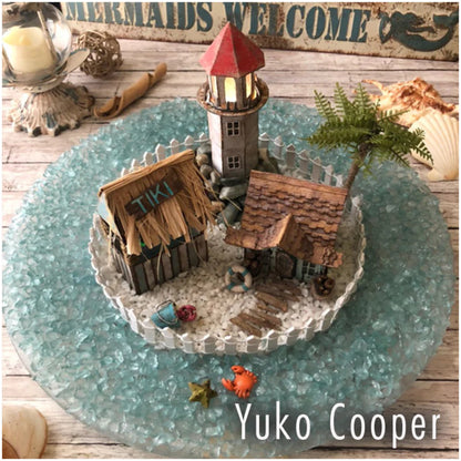 Village Collection ... Thinlits - Die Cutting Templates by Tim Holtz and Sizzix (product id 665564). Imagine building a miniature row of buildings with all their features ease! Create the shape of a building and add steeples, windows, tiles, doors, chimneys, all with depth, colour variations and 3D elements without spending hours fussy cutting with scissors. Photo of a lighthouse and island by Yuko Cooper.