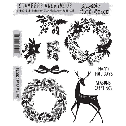 Styled Woodlands ... red rubber stamp set by Tim Holtz and Stampers Anonymous (cms210). Designs for creating junk journals, accordion booklets, ATCs and cards, journal pages, scrapbooking, art, postcards, tags, mixed media and other crafty papercrafts. 9 (nine) designs. modern styles of holly and pine wreaths, a wonderful reindeer, sweet ribbon tied in a bow, sprigs of holly, poinsettia and pinecone plus two greetings in uppercase - happy holidays and seasons greetings.