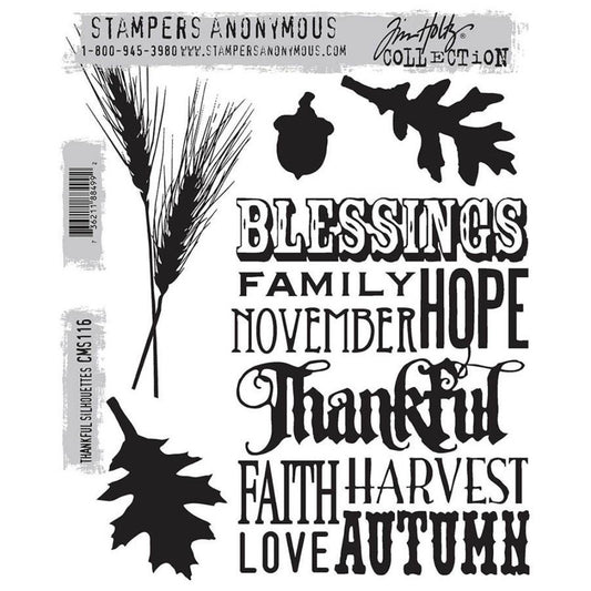 Thankful Silhouettes ... Cling Stamp Set by Tim Holtz and Stampers Anonymous (cms116).  a background of words in various typestyles (blessings, family, November, hope, thankful, faith, harvest, love, Autumn), leaves, an acorn and pair of wheat stalks. Perfect for using as mindful planner pages, thank yous, remembrance, Autumn, and anything to do with squirrels (it has oak leaves and acorns).