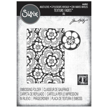 Lace - Texture Fades Embossing Folder ... by Tim Holtz and Sizzix (no.666865). Inspired by vintage lacework, doilies, curtains and tablecloths, this embossing folder creates a beautiful pattern to use with paper, vellum and cardstock. The detailed design and linework create amazing dimensional texture, ideal for all kinds of papercrafts, pockets, junk journals, scrapbook pages, card backgrounds, anything you wish to make! From the Vault! Image of the pack.