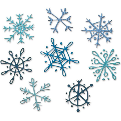 Scribbly Snowflakes ... Thinlits - Die Cutting Templates by Tim Holtz and Sizzix (prodoct id 665582).

Imagine adding many layers into your project with ease! Create depth, colour variations and 3D elements without spending hours fussy cutting with scissors.

This set features 8 (eight) different snowflakes in wonderful relaxed styles.