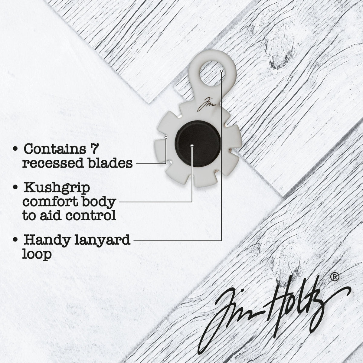 Paper Distresser - by Tim Holtz and Tonic Studios ... this is a tool for roughing up paper, cardstock edges and cutting threads in papercrafts, mixed media and tactile crafts. Includes a Kushgrip holder, hanging loop and 7 sharp recessed edges. Ergonomic Kushgrip round centre spot for comfort during handling, with very sharp steel blades recessed within the grey round plastic surround. It is safe to hold and easy to use. Photo from Tonic Studios of tool with information.