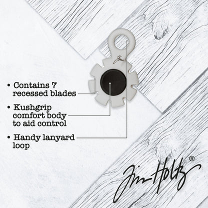 Paper Distresser - by Tim Holtz and Tonic Studios ... this is a tool for roughing up paper, cardstock edges and cutting threads in papercrafts, mixed media and tactile crafts. Includes a Kushgrip holder, hanging loop and 7 sharp recessed edges. Ergonomic Kushgrip round centre spot for comfort during handling, with very sharp steel blades recessed within the grey round plastic surround. It is safe to hold and easy to use. Photo from Tonic Studios of tool with information.