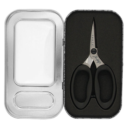 Haberdashery Scissors - 5 inch ... by Tim Holtz. Sharp embroidery scissors with 40mm blades (measured along the inside cutting edge). Made by Tonic Studio with titanium coated, precision ground, ultra sharp blades, these strong, durable scissors are built to last. With its resistance to rust and corrosion, this pair of scissors is perfect for any of your projects whether in the sewing room, craft room or art studio.