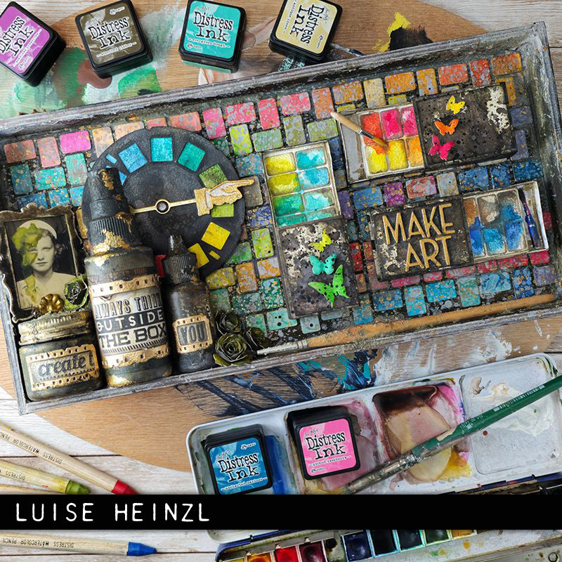 Colourful palette tray display by Luise Heinzl - using Picture Show - from the Vault ... Thinlits Die Cutting Templates by Tim Holtz and Sizzix (no.666602). Brought back to life by Tim and Sizzix, these vintage designs have been reimagined as in a different size for art and creativity. These designs cut out various pieces relating to photography, film making and framing. A long film strip, vintage picture wheel, a slide or single negative film strip, plus various squares and rectangles to match.