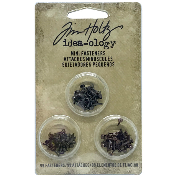Mini Fasteners - Idea-Ology Screw Top Fasteners ... by Tim Holtz - Pack of 99 Small Brads or Split Pins.  Mini Fasteners ... A slender metal split pin with a tiny flat head resembling a screw or cross, used to secure layers, objects or parts together. Each fastener is approx 1/16" wide and 6-7mm long. 