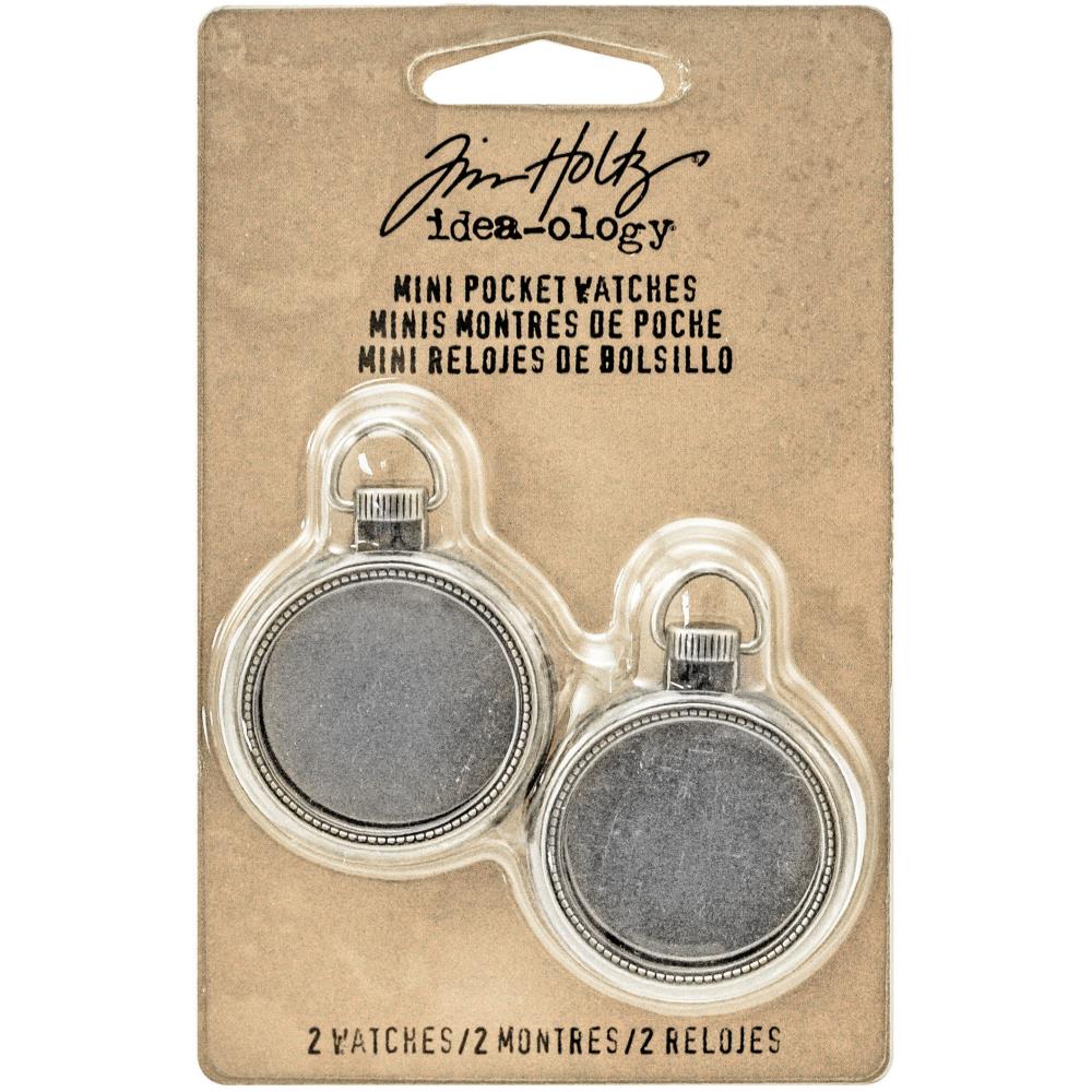 Mini Pocket Watch - Tim Holtz Idea-Ology ... small fob watch frames made of metal with a glass front piece. Each is 1 1/4" wide, pack of 2 (two) frames.  These 2 (two) vintage style, silver coloured metal pocket watch frames are ideal to turn into a locket, photo frame, miniature garden, or add to a mixed media artwork. Each metal pocket watch has a removable back to customise the inside area. It has a glass-like front piece (feels like glass) and a handy template for each size. TH93274