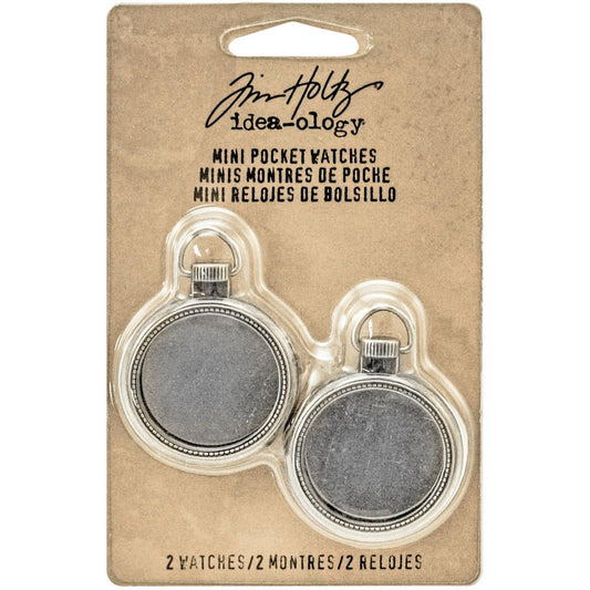 Mini Pocket Watch - Tim Holtz Idea-Ology ... small fob watch frames made of metal with a glass front piece. Each is 1 1/4" wide, pack of 2 (two) frames.  These 2 (two) vintage style, silver coloured metal pocket watch frames are ideal to turn into a locket, photo frame, miniature garden, or add to a mixed media artwork. Each metal pocket watch has a removable back to customise the inside area. It has a glass-like front piece (feels like glass) and a handy template for each size. TH93274