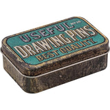 Trinket Tins - Idea-Ology by Tim Holtz ... empty metal boxes with hinged lid and wonderfully nostalgic vintage advertising on the lids. 2 (two) Trinket Tins, one of each design, 4" x 2.5", x 1.25" deep in size. Designed by Tim Holtz, this pair of metal tins have hinged lids that have reliable closures. The size of the tins make them versatile for both storage as well as altering to become decorated storage tins, giftware or ornaments for display. Photo of the Drawing Pins tin.