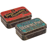 Trinket Tins - Idea-Ology by Tim Holtz ... empty metal boxes with hinged lid and wonderfully nostalgic vintage advertising on the lids. 2 (two) Trinket Tins, one of each design, 4" x 2.5", x 1.25" deep in size. Designed by Tim Holtz, this pair of metal tins have hinged lids that have reliable closures. The size of the tins make them versatile for both storage as well as altering to become decorated storage tins, giftware or ornaments for display.