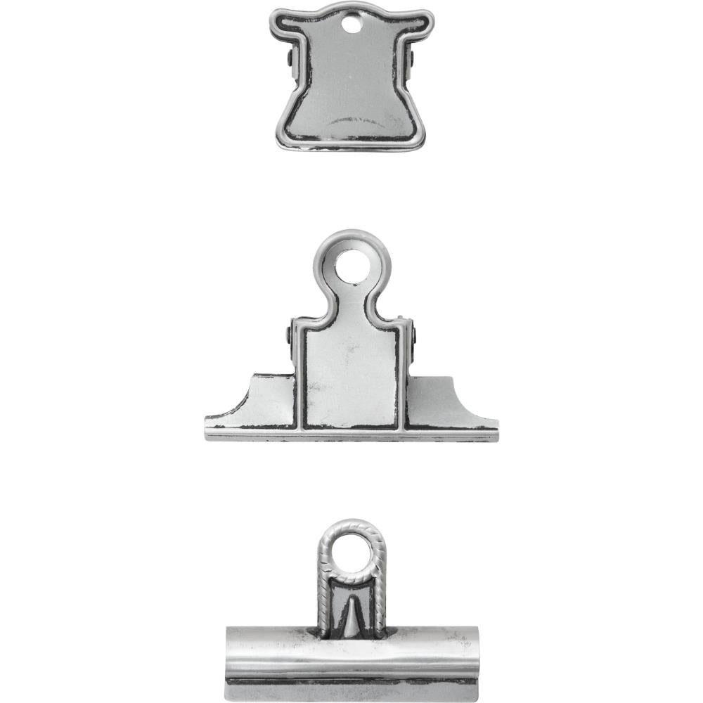 topview overview of the Vintage Clips - Idea-Ology by Tim Holtz - 3 (three) strong, old style metal hinged clips used to attach and hold artwork, memorabilia and other items together. Sizes are approx (as shown in the photo) ...  - top : 1 3/4" wide - middle : 3" wide - bottom : 2 1/2" wide ... all 3 would hold at least a 1cm thick wad of paper. 