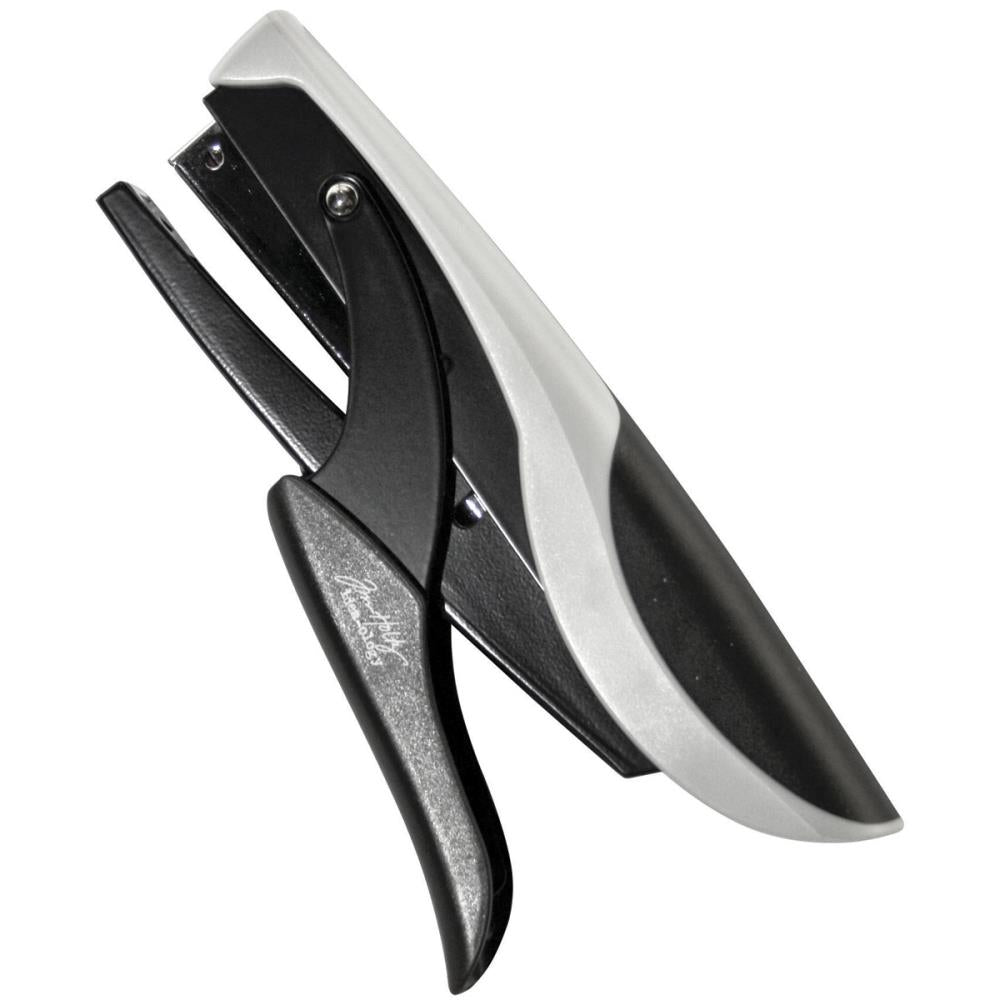 Tiny Attacher (stapler) ... by Tim Holtz - a tool for fastening or affixing layers together with miniature staples. 1 (one) hand held stapler with 2 strips (90 pieces) of staples.   Tim's Idea-Ology Tiny Attacher is a versatile way to fasten those hard to glue down items. The Tiny Attacher is a sturdy, durable, easy to squeeze stapler, a similar size to a regular office stapler. Photo of the tool.