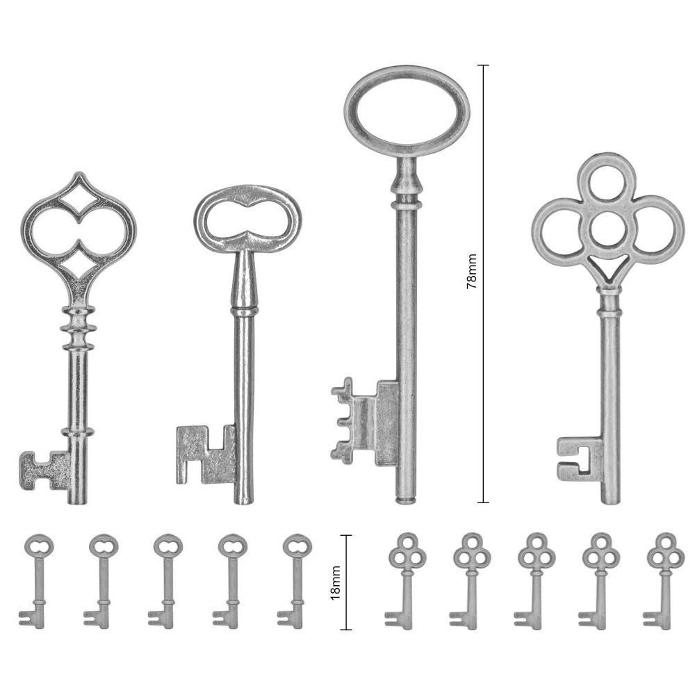 Tim Holtz Idea-Ology - Adornments Keys . This pack of metal keys are finished in an antique style pewter colour. With 4 (four) large keys and 10 (ten) miniature keys in 2 (two) styles, there's something for any project whether its a birthday card or for the front cover of a journal. The tiny keys are a perfect size for a dolls' house too! Photo showing dimensions.