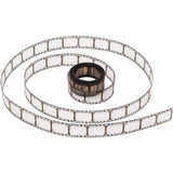 example of Film Strip Ribbon - Idea-Ology Trimmings by Tim Holtz ... 3 yards (108 inches or 2.74 metres) of printed transparent frames (plastic, acetate) with realistic (miniaturised) camera film cog holes. Roll is 17mm or 11/16" wide.
