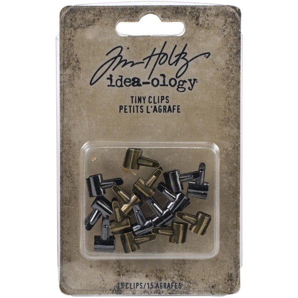 Tiny Metal Clips ... by Tim Holtz Idea-Ology - miniature metal hinge clips used to attach elements onto cards, mixed media, journaling, scrapbooking, papercrafts and other visual arts. 15 (fifteen) clips in 3 (three) antique colours. Each clip is approx 13mm x 7mm x 4mm. 