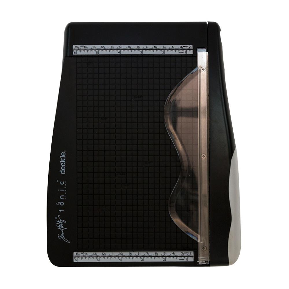 top view photo of Deckle Blade Trimmer by Tim Holtz and Tonic Studio - Tim Holtz Deckle (Torn Edge) Blade Guillotine Paper Cutter - with a unique torn edge style blade, ergonomic comfort Kushgrip handle. Use to create the look of rugged torn edges to paper and cardboard easily and quickly. Made by Tonic Studio with precision ground, ultra sharp blade with a rough ragged pattern, this strong trimmer is built to last.