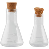 Laboratory Flasks ... by Tim Holtz - Miniature glass flasks with cork lids, used to hold objects for assemblage projects, diorama, off-the-page marvels and party decor.  Package of 2 (two) small glass bottles (in the shape of scientist flasks) with little cork lids and measurement markings. Sizes (approx) : 2" x 1 1/16" and 2 3/8" x 1 1/2".