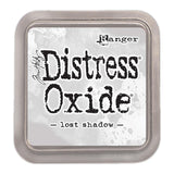 Lost Shadow - Distress Oxide Ink Pad by Tim Holtz and Ranger (also called stamp pad or InkPad), a square of felt that is used for applying ink to rubber and clear stamps or creating backgrounds using a craft mat (swiping, smooshing and marbelling). Ink pad casing is 3"x3", the felt is 2"x2".