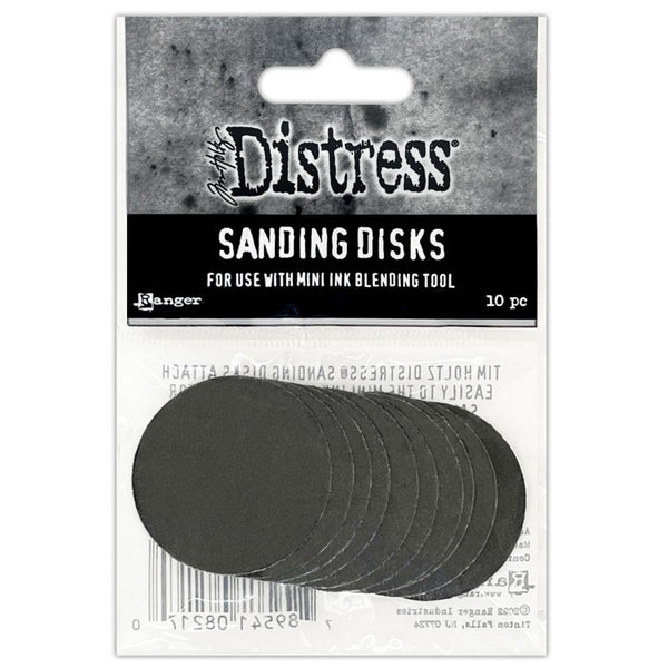 Sanding Discs ... by Tim Holtz Distress and Ranger. Pack of 10 (ten) round pieces of ready to use sand papers with a fine grit. Each is 1" (2.5cm) wide.  Using the ergonomic Ink Blending Tool Handle (sold separately) with these little round sanding discs, create distressed edges, scuffed layers and sand off embossed cardstock to reveal the core quickly and easily. 