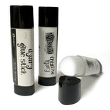 showing an open Ranger Ink's Dylusions by Dyan Reaveley Dyary Glue Stick for sale at Art by Jenny