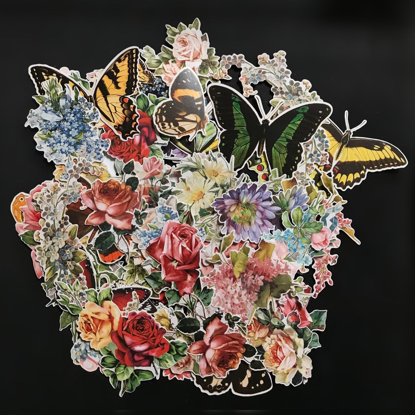 Botanical - Idea-Ology Layers ... by Tim Holtz ... over 80 gorgeous images die cut, ready to use. Made of thin durable cardstock with a satin finish. Over 80 assorted die-cut pieces, neatly trimmed out of quality cardstock with only a fraction of a white border around the image. Ready to use at a moment's notice. Designs include beautiful vintage illustrations of roses, blooms, daisies, bouquets, posies and single flowers with a variety of butterflies in different sizes, colours and species.