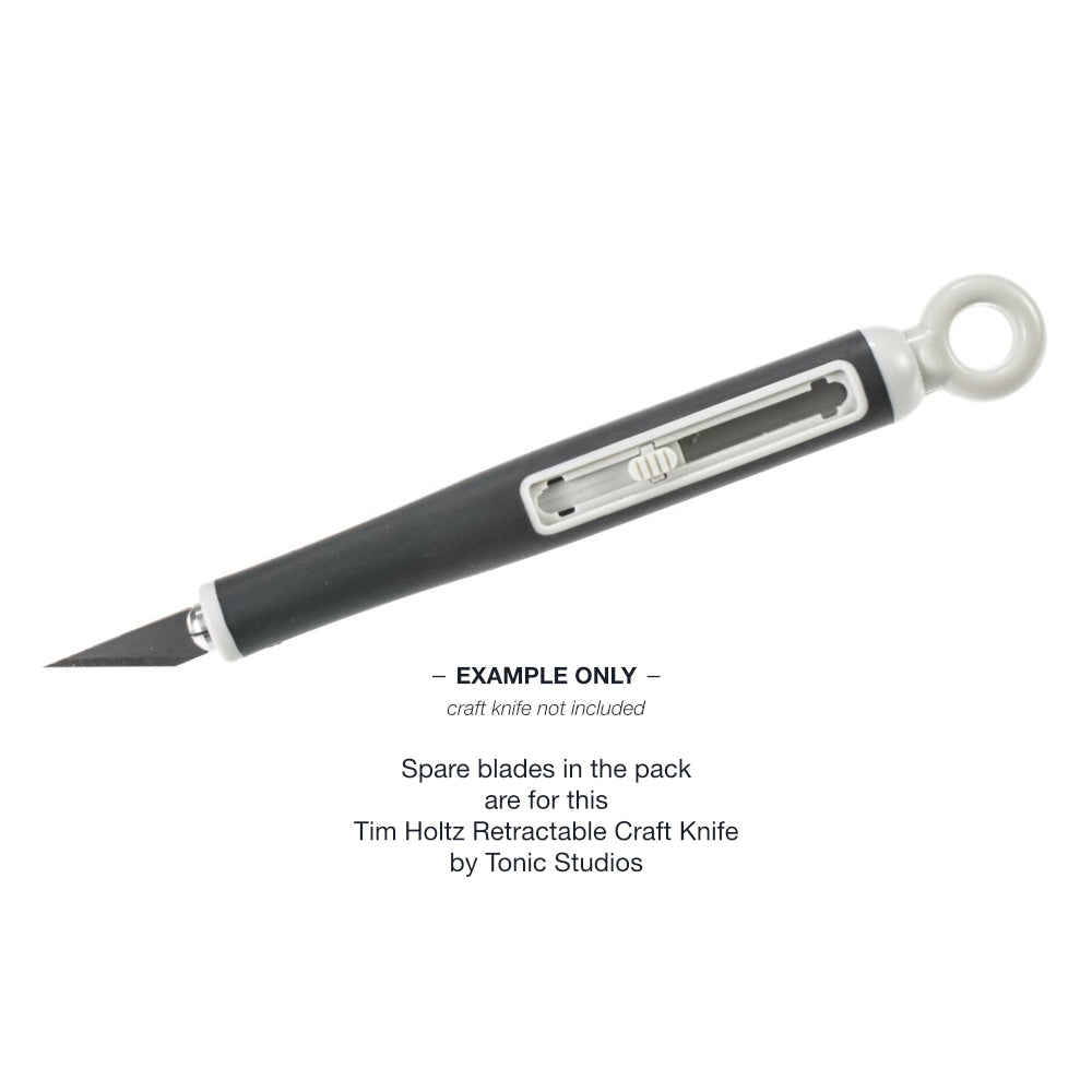 Photo of example of use - Long Pointy - Spare Blades (Refill no.3357EUS) - by  Tim Holtz by Tonic Studios ... to use with the Tim Holtz Retractable Craft Knife (no.3356E, not included, sold separately).   This is the pack contains 5 (five) spare blades and basic instructions on the back of the pack. These are very sharp, durable pointy, steel blades with a long triangular shape. The very sharp working edge is approx 20mm long.