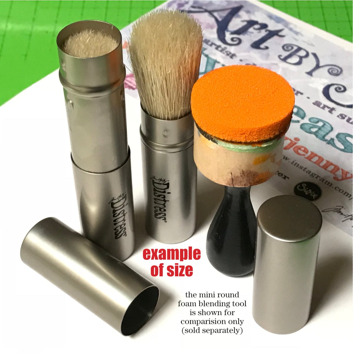 Tim Holtz Distress Blending Brush ... Pack of 2 shown with a Mini Distress Foam Blending Tool - Distress Blending Brush ... by Tim Holtz. Natural bristle brush with retractable silver coloured casing and lid. 2 (two) brushes.  Tim's fantastic retractable blending brush brings together a traditional stencil brush and the shape and versatility of a makeup brush. The bristles feel softer with the rounded shape, giving you the flexibility for distressing and blending styles.