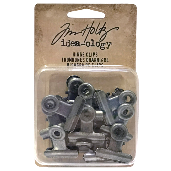 Metal Hinge Clips, Small - 3/4" (19mm) wide ... by Tim Holtz - 15 (fifteen) metal clips with hinged opening, used to attach and hold artwork, memorabilia and other items together. Each is 3/4" or 19mm wide.   Inspired by antique stationery clips, these versatile spring loaded clips are so useful for attaching and holding tiny objects and embellishments to tags, photos, books, lists, pages and other creations. TH92692