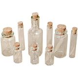 example of Glass Vials with Corks ... by Tim Holtz Idea-Ology - Use for mixed media, assemblage projects, off-the-page marvels and party decor. Pack of 9 (nine) glass bottles with cork lids. Four different shaped bottles, sizes vary from 1 1/4" to 3" high.  Add to your project, off-the-page marvel, canvas or other artistic creation and attach using trimmings, fasteners or collage medium. Alter using alcohol inks, texture pastes, Distress crayons or Distress paints. 