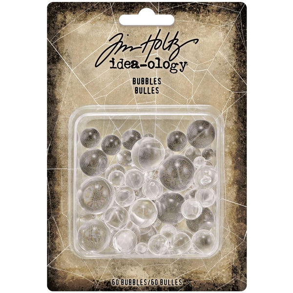 Bubbles ... by Tim Holtz Idea-Ology - Clear round beads with no holes (spheres, baubles) of varying sizes. Use for mixed media, assemblage projects, off-the-page marvels and party decor. Pack of 60 Bubbles.