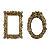 example of Gothic Frames ... by Tim Holtz Idea-Ology - Use these detailed vintage inspired, gold coloured resin frames for mixed media, assemblage projects, off-the-page marvels and party decor. Pack of 2 (one) pieces - one oval and one rectangular.