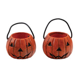 Jack O Lanterns ... by Tim Holtz Idea-Ology - miniature pumpkin buckets moulded from durable resin, with wire handles and cheerful faces.