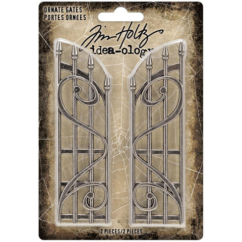 Ornate Gates - by Tim Holtz Idea-Ology - One pair of metal gates inspired by wrought iron fencing. Each piece, left and right, has a stylish scroll decoration and pointy posts. Use for cardmaking, assemblage projects, off-the-page marvels and party decor. Pack of 2, each 4" high x 1 1/8 " wide. TH94159 Beautifully made pair of metal wrought iron styled gates. Large enough to suit large projects, but will fit on a 6x4 mixed media greeting card too.