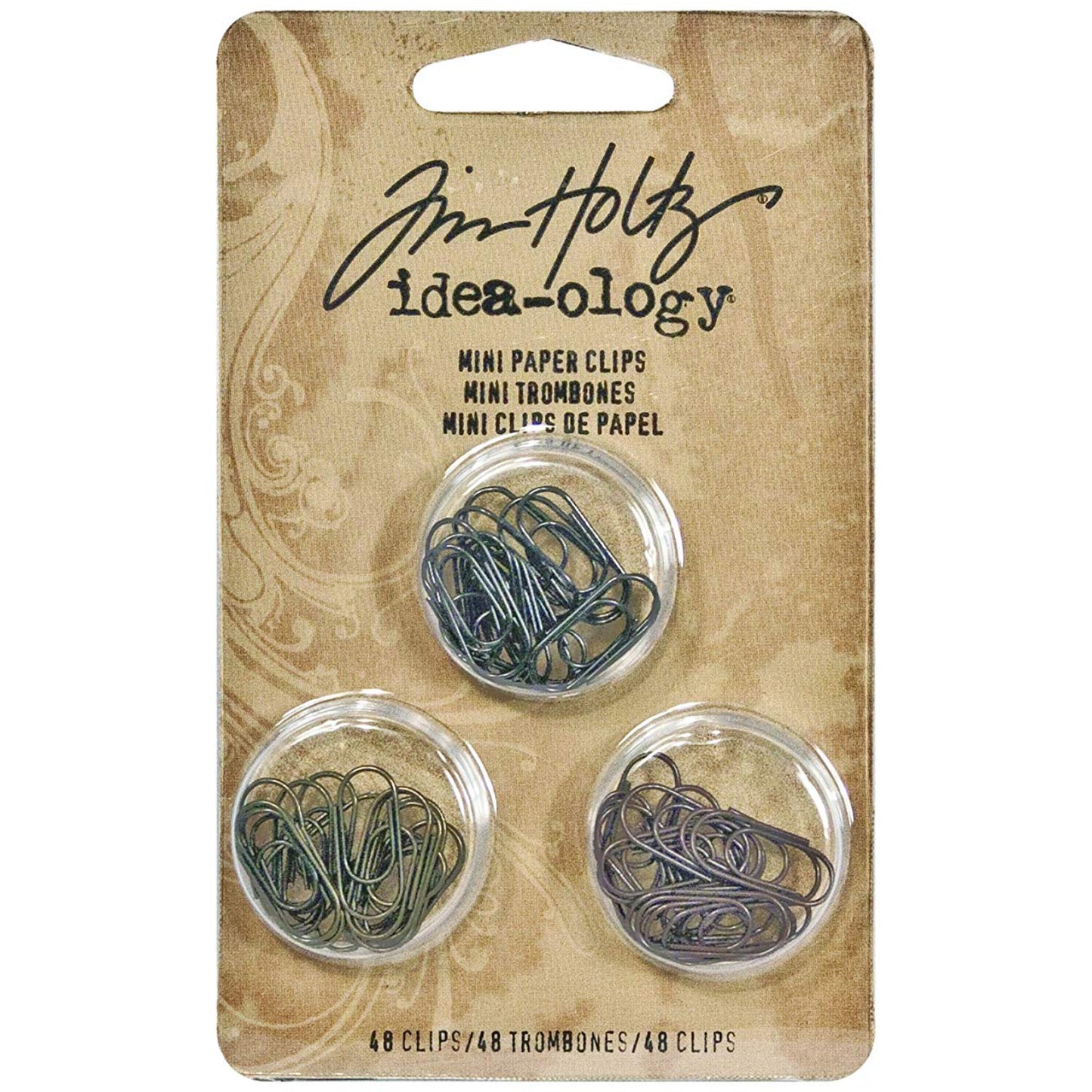 Idea-Ology Paper Clips ... by Tim Holtz - mini metal paperclips used to attach things to other things - papers, fabrics, cards, ephemera. 48 (forty eight) paperclips, 1.5cm (1/2") long, 3 antique colours (16 of each). TH92791.

Inspired by antique stationery fasteners, these small and versatile paper clips are perfect for attaching anything to anything - including ribbons, tinsel, yarn, paper, buttons, trinkets and other embellishments together.