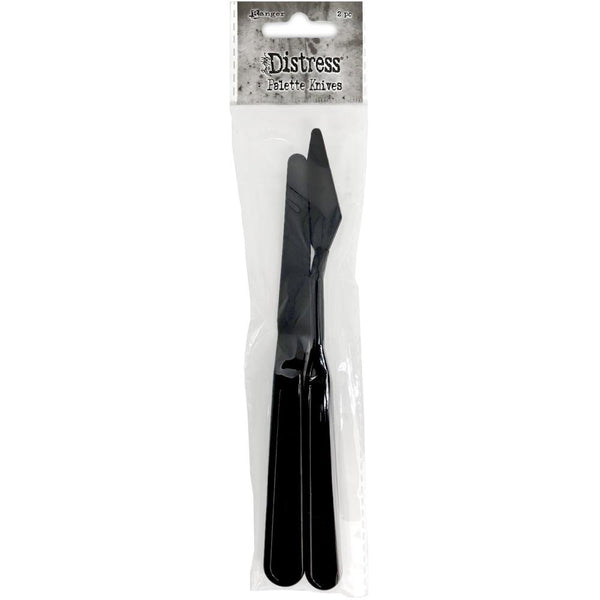 Palette Knife Set ... Tim Holtz and Ranger - 2 (two) painting knives made of black plastic. Tools for mixed media, papercrafts, visual arts and painting.  Tim Holtz Spatulas are such versatile tools for any project using any type of texture pastes, mediums and paints. Each of the palette knives are made from a durable, single-moulded black plastic. They are light, flexible and easy to hold and use.  Sizes (approx) are from 7" to 7 1/2" long. Pack of 2 (two) plastic palette knives.