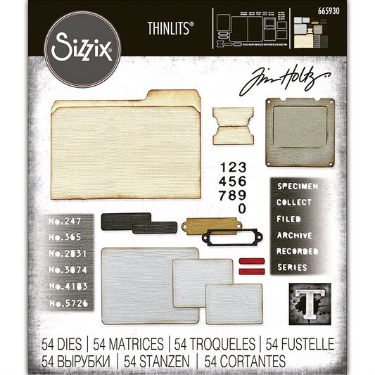 Specimen - Sizzix Thinlits die cutting templates by Tim Holtz. 54 (fifty four) assorted labels, tags, tickets, numerals, slide frame and a 4 1/2" x 6 1/8" file folio folder with tab and detailed corners (no.665930). This set of Thinlits and Framelits include designs that will enable you create a fantastic variety of envelopes, tags, labels, banners, tickets, stationery pieces, journal fodder, junk journal pages, scrapbooking elements and much more.  Image of the pack.