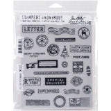 photo of Holiday Postmarks ... stamp set by Tim Holtz - 26 (twenty six) cling mounted red rubber stamps (CMS338).   A wonderful collection of vintage inspired postmarks, stamps, labels, a pointing hand, Christmas tree, round label with the North Pole and reindeer, oval marks, rectangle banners and much more.