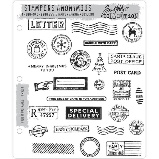 Holiday Postmarks ... stamp set by Tim Holtz and Stampers Anonymous - 26 (twenty six) cling mounted red rubber stamps (CMS323).   A wonderful collection of vintage inspired postmarks, stamps, labels, a pointing hand, Christmas tree, round label with the North Pole and reindeer, oval marks, rectangle banners and much more.