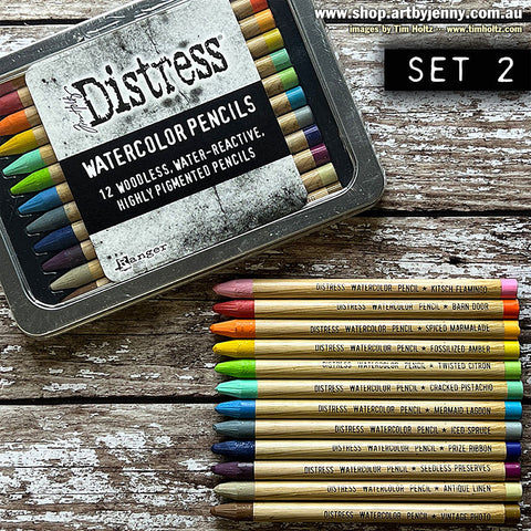 Distress Watercolour Pencils, set 2 ... by Tim Holtz. 12 (twelve) woodless watercolour pencils in Kitsch Flamingo, Barn Door, Spiced Marmalade, Fossilized Amber, Twisted Citron, Cracked Pistachio, Mermaid Lagoon, Iced Spruce, Prize Ribbon, Seedless Preserves, Antique Linen, Vintage Photo. One of each colour. 