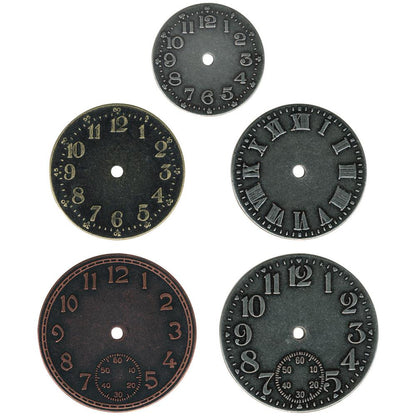 TimePieces Metal Idea-Ology Adornments by Tim Holtz - 5 (five) round metal coins with a polished finish, featuring clock faces with numbers and Roman numerals. Designed by Tim Holtz, this set of metal embellishments add a special element to cardmaking, memory keeping as well as journaling, collage, visual arts and mixed media. Inspired by all things vintage, the colours are Antique Nickel, Brass and& Copper. TH92831 . 30mm-44mm in size.