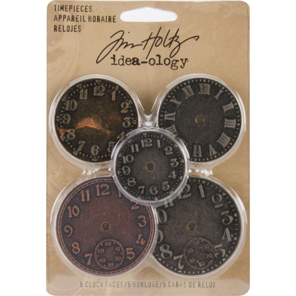 TimePieces Metal Idea-Ology Adornments by Tim Holtz - 5 (five) round metal coins with a polished finish, featuring clock faces with numbers and Roman numerals. Designed by Tim Holtz, this set of metal embellishments add a special element to cardmaking, memory keeping as well as journaling, collage, visual arts and mixed media. Inspired by all things vintage, the colours are Antique Nickel, Brass and& Copper. TH92831