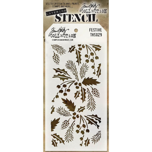Tim Holtz Layering Stencil - Festive . design of holly, berries and pine tree foliage.